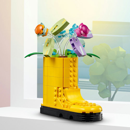 Regenlaars met bloemen